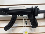 Used Ruger 10/22 22LR 16" bbl 1 25rnd mag after market foldable stock good condition - 8 of 21