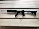 Used Ruger 10/22 22LR 16" bbl 1 25rnd mag after market foldable stock good condition - 2 of 21