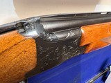 Used Winchester 101 Top SingleTrap Combo 12 34" full
32" bott imp mod
top full
good condition luggage case - 23 of 25