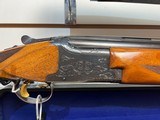 Used Winchester 101 Top SingleTrap Combo 12 34" full
32" bott imp mod
top full
good condition luggage case - 21 of 25