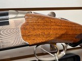Used Beretta 686E 12 Gauge 30" bbl luggage case11 chokes good condition - 8 of 24