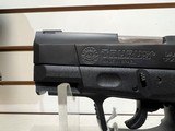 Used taurus PT24/7 3" bbl.40 sw 2 14rnd mags range bag good condition - 3 of 16
