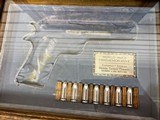 (M) COLT 1911 RHEIMS COMMEMORATIVE SEMI-AUTOMATIC PISTOL IN DISPLAY CASE. very good condtion - 9 of 18