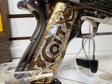 (M) COLT 1911 RHEIMS COMMEMORATIVE SEMI-AUTOMATIC PISTOL IN DISPLAY CASE. very good condtion - 13 of 18