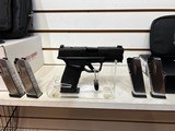 new SPG HELL PRO OSP 9MM PST 15RD new in box with gear up bag 5 mags and load assist toolnew condition - 19 of 25