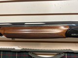 Used Benelli 828U 12 Gauge 28" bbl 7 chokes luggage case tools etc good condition - 8 of 22