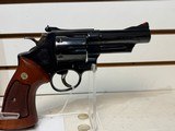 Used Smith & Wesson Model 57 41 Mag 4 inch barrel blued wood grips, Original Blue box, redone inside. - 13 of 20