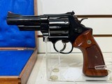 Used Smith & Wesson Model 57 41 Mag 4 inch barrel blued wood grips, Original Blue box, redone inside. - 2 of 20