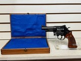 Used Smith & Wesson Model 57 41 Mag 4 inch barrel blued wood grips, Original Blue box, redone inside. - 1 of 20