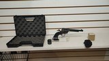Used Colt Peacemaker. Case colored. 22LR and 22WMR cylinders. 6