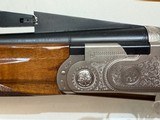 Used Beretta 686 Top SingleTrap 12 Gauge 34" bbl adj comb 3 chokes barrel weights tools good condition - 10 of 25