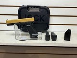 new GLK 17G5 9MM 17RD GOLD SLIDE ACG-57017 new in box - 1 of 13