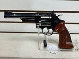Used Blued Smith & Wesson Model 27, 357 Magnum, wood grips - 1 of 16