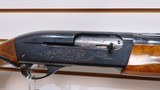 used Remington 1100 12 Gauge 26" fixed choke skeet factiry custom wood very good condition - 9 of 24