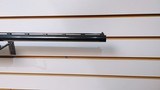 used Remington 1100 12 Gauge 26" fixed choke skeet factiry custom wood very good condition - 19 of 24