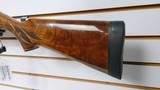 used Remington 1100 12 Gauge 26" fixed choke skeet factiry custom wood very good condition - 2 of 24