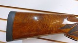 used Remington 1100 12 Gauge 26" fixed choke skeet factiry custom wood very good condition - 14 of 24