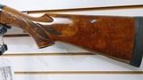 used Remington 1100 12 Gauge 26" fixed choke skeet factiry custom wood very good condition - 4 of 24