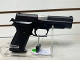 Used Browning/Sig Sauer Pistol 45ACP 4 1/4" bbl
1 mag no box no manual missing 1 grip screw good condition - 10 of 16