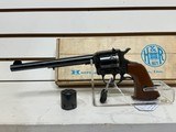 used H&R model
676 22LR and 22WMR 7 1/2" bbl
original box both cylinders included