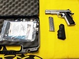 KIMBER 1911 9MM STAINLESS LW LNIB WITH TWO MAGAZINES AND TWO SET OF GRIPS - 1 of 3