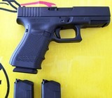 GLOCK PISTOL G19 GEN 4, 9MM COMPLETE IN BOX WITH THREE MAGAZINES, GRIPS, AND LOADER PLUS + - 3 of 3