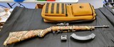 RUGER 10-22 TAKE DOWN WITH CAMO, FLASH HIDER, LASER SIGHT, 10 ROUND MAGAZINE AND 25 ROUND RUGER MAGZINE RUGER CARRYING BAG - 3 of 3