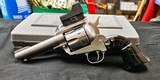 RUGER NEW MODEL BLACKHAWK 357 MAGNUM WITH TWO SETS OF GRIPS AND RED DOT - 1 of 3
