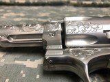 Ruger Stainless Steel engraved Redhawk chambered for 6 rounds of 44 Mag. - 5 of 7