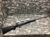 Stainless Steel Remington Model 700 in 338 Win Mag - 1 of 9