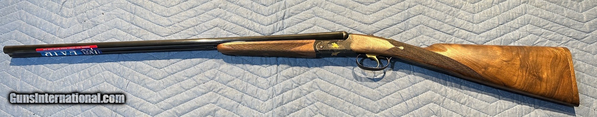www.gunsinternational.com