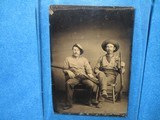 AN EARLY CIVIL WAR 1/6 PLATE TINTYPE OF TWO RHODE ISLAND BROTHERS, ONE HOLDING A HENRY RIFLE FROM EAST GREENWICH THAT TRAINED SOLDIERS IN CIVIL WAR! - 1 of 3