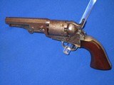 AN EARLY CIVIL WAR PERCUSSION COLT MODEL 1849 POCKET REVOLVER WITH A 4 INCH BARREL IN NICE UNTOUCHED CONDITION! - 1 of 14