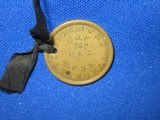 AN EARLY U.S. CIVIL WAR ID TAG IDENTIFIED TO "GEORGE A. HUNT" OF THE N.Y. 76TH INFANTRY WHO DIED FROM HIS WOUNDS AT GAINESVILLE, VA 14 DAYS - 4 of 5