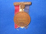 A TIFFANY MADE VETERANS BADGE PRESENTED FROM THE STATE OF OHIO TO "JOHN HUMPHREY, CO. A, 4TH CAVALRY" WITH ITS ORIGINAL RIBBON IN FINE UNTOU - 1 of 5