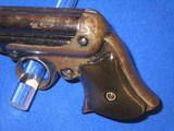 AN EARLY AND SCARCE REMINGTON ELLIOTT FOUR BARREL REPEATING PEPPERBOX DERINGER WITH ORIGINAL CARDBOARD BOX IN FINE UNTOUCHED CONDITION! - 3 of 17