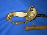 An Early 1800's U.S. Military Eagle Head Officers Sword With A Blue And Gold Blade Made By 