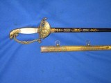 An Early 1800's U.S. Military Eagle Head Officers Sword With A Blue And Gold Blade Made By 