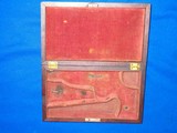 An Early and Scarce Civil War Factory Deluxe Contoured Case For A Percussion Colt Model 1849 Pocket Revolver With A 4 Inch Barrel In Fine Plus Untouch - 1 of 4