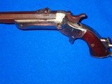 An Early Single Shot Heavy Frame Stevens Hunter's Pet Pocket Rifle No. 34 with Detachable Shoulder Stock - 2 of 4