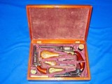 Triple Colt Cased Set, Colt Model 1851 Navy Revolver, Colt Model 5A,1855 Root Revolver, and  Colt Model 1849  Pocket Revolver With Accessories - 2 of 4