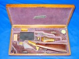 Deluxe Double Cased Set For A Pair Of Percussion Colt 1860 Army Revolvers & An Original Martially Marked Army Shoulder Stock With Accessories       