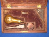 An Early Civil War Colt Model 1849 Percussion Pocket Revolver With A 4 Inch Barrel In Its Original Factory Case With Accessories In Very Good Untouche - 14 of 16