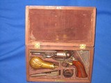 An Early Civil War Colt Model 1849 Percussion Pocket Revolver With A 4 Inch Barrel In Its Original Factory Case With Accessories In Very Good Untouche - 1 of 16