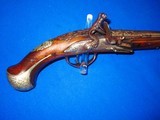 Early, & Large 1700's Ornate European Silver Mounted With A Raised Chiseled Barrel, Lock, And Hammer Flintlock Pistol  - 3 of 4