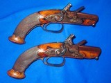 Early 1700's To 1800's Pair Of Large Bore Flintlock Pistols By 