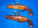 Early 1700's To 1800's Pair Of Large Bore Flintlock Pistols By 