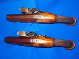 Early 1700's To 1800's Pair Of Large Bore Flintlock Pistols By 