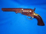An Early Civil War Colt Model 1849 Pocket Revolver With A 6 Inch Barrel