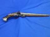 Very Scarce, Early, & Large Circa Early 1700's Ornate European Silver Mounted With A Raised Chiseled Barrel, Lock, & Hammer Flintlock Pistol Excellent - Image 1 of 14